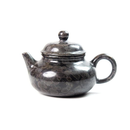 Discover the Artistry of the RONG TIAN Teapot: Where Nature Meets Tradition